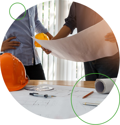 Men with building plans at table