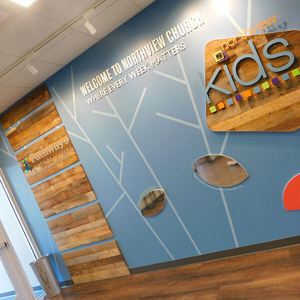 wooden wall with kids sign