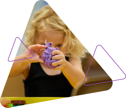 Girl looking at toy